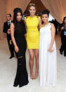 Kim opted for a gothic look in Alaia. Her sister, Kourtney, went Grecian in a Raoul gown, and both Kardashians nearly disappeared standing next to the super sexy Heidi Klum, who put them both to shame in her Versace mini and Louboutin pumps.