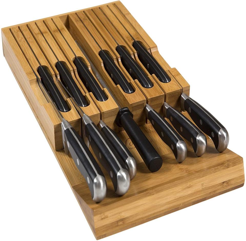 Make more counter space and keep your knives from shuffling around your drawer with <a href="https://amzn.to/34cxP8e" target="_blank" rel="noopener noreferrer">this in-drawer knife block</a>. If you're also short on drawer space, we recommend <a href="https://amzn.to/2Gmz2l4" target="_blank" rel="noopener noreferrer">a magnetic knife holder</a> that attaches to the wall. Find it for $26 on <a href="https://amzn.to/34cxP8e" target="_blank" rel="noopener noreferrer">Amazon</a>.