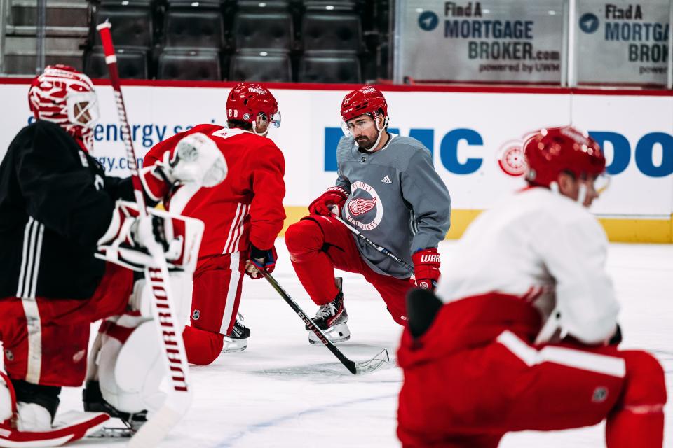 Dylan Larkin, Patrick Kane at morning skate before a game against the Carolina Hurricanes at Little Caesars Arena in Detroit, Michigan on December 14, 2023. (Allison Farrand / Ilitch Sports)