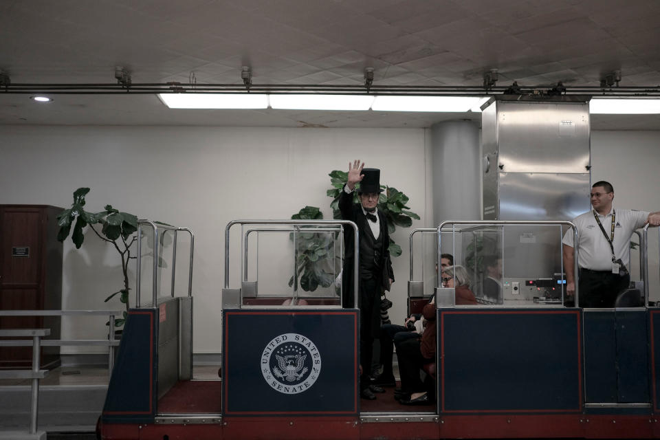 George Buss, a Lincoln impersonator, rides the Senate subway before the impeachment vote at the Capitol in Washington, D.C., on Feb. 5, 2020. | Gabriella Demczuk for TIME