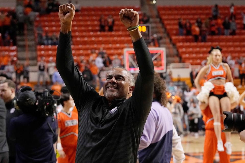 Kansas State coach Jerome Tang acknowledges the Wildcat fans in the Gallagher-Iba Arena stands after Saturday's 73-68 victory over Oklahoma State.