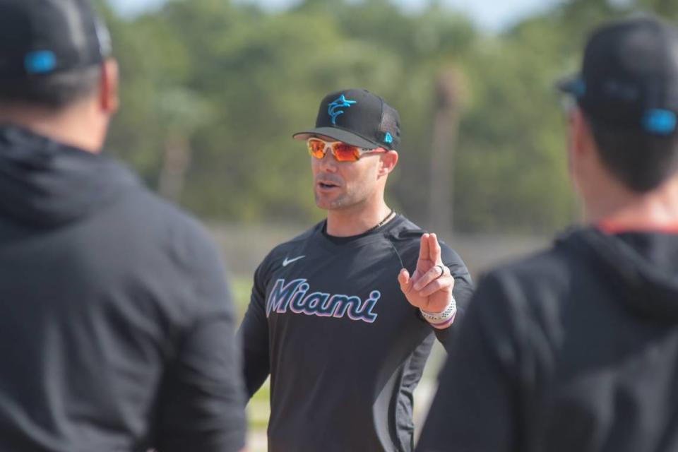 Miami Marlins manager Skip Schumaker gives instructions during a spring training workout on Feb. 17, 2023, at the Roger Dean Chevrolet Stadium complex in Jupiter, Florida.