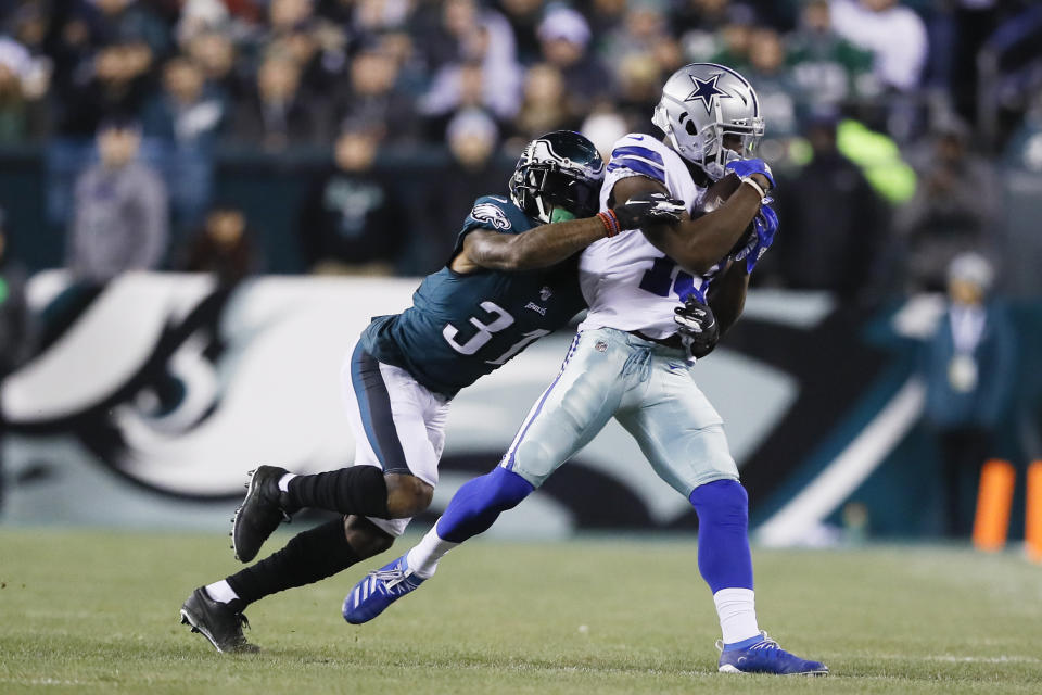 Dallas Cowboys wide receiver Michael Gallup, right, catches a pass as Philadelphia Eagles cornerback Jalen Mills defends during the first half of an NFL football game Sunday, Dec. 22, 2019, in Philadelphia. (AP Photo/Michael Perez)