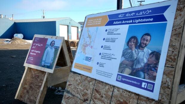 Campaign posters are already up at the major intersections in Iqaluit, with only one month to go before the Oct. 25 Nunavut election. (Matisse Harvey/Radio-Canada - image credit)