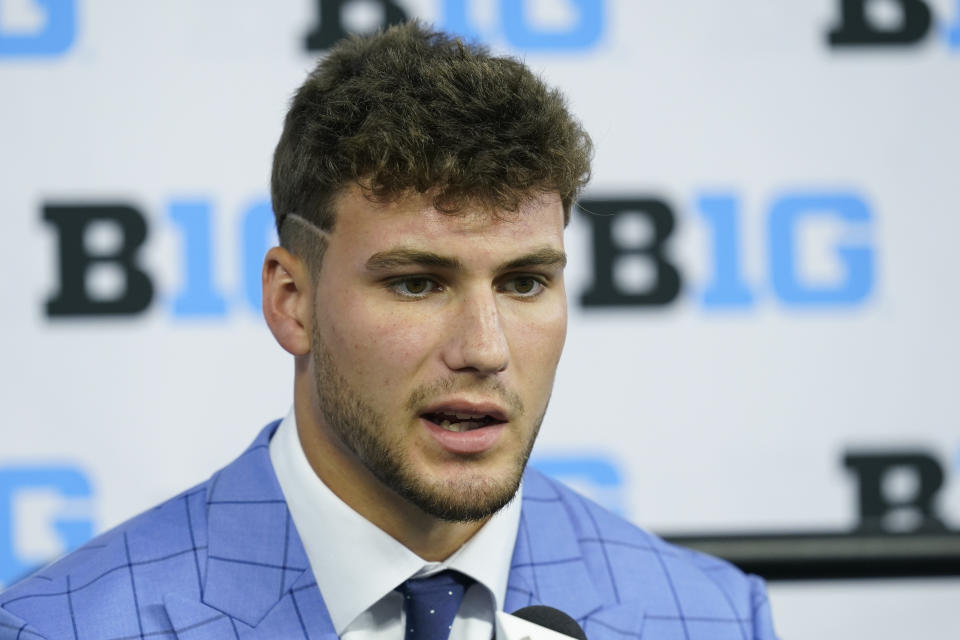 Indiana tight end AJ Barner talks to reporters during an NCAA college football news conference at the Big Ten Conference media days, at Lucas Oil Stadium, Tuesday, July 26, 2022, in Indianapolis. (AP Photo/Darron Cummings)