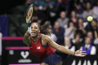 United States' Serena Williams returns a shot against Latvia's Anastasija Sevastova during a Fed Cup qualifying tennis match Saturday, Feb. 8, 2020, in Everett, Wash. (AP Photo/Elaine Thompson)