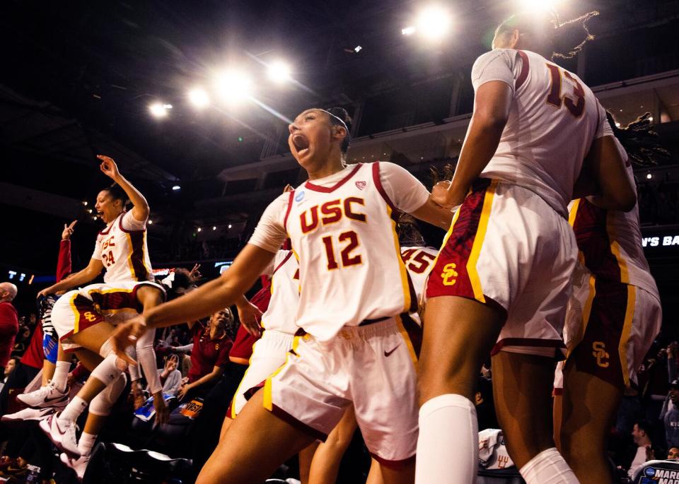 USC freshman JuJu Watkins, center, celebrates in the final seconds of an NCAA tournament win over Texas A&M Corpus Christi.