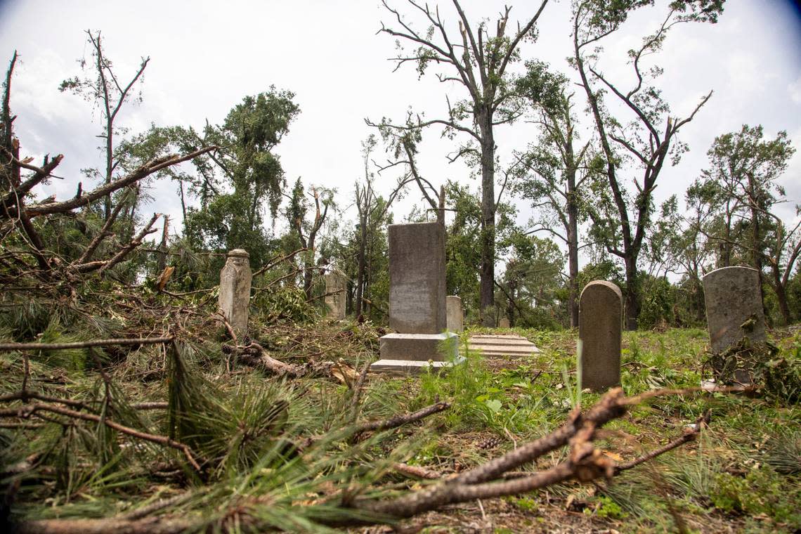 Downed trees and limbs lay in the path of a tornado in a cemetery near Rocky Mount Thursday, July 20, 2023. An EF3, tornado with wind speeds of 150 mph touched down in Nash County Wednesday around 12:30 p.m. Wednesday according to the Raleigh National Weather Service. Travis Long/tlong@newsobserver.com