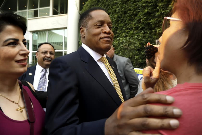 WOODLAND HILLS, CA - AUGUST 24, 2021 - Conservative radio talk show host Larry Elder, who is running for governor of California, greets supporters at the Warner Center Marriott in Woodland Hills on August 10, 2021. (Genaro Molina / Los Angeles Times)