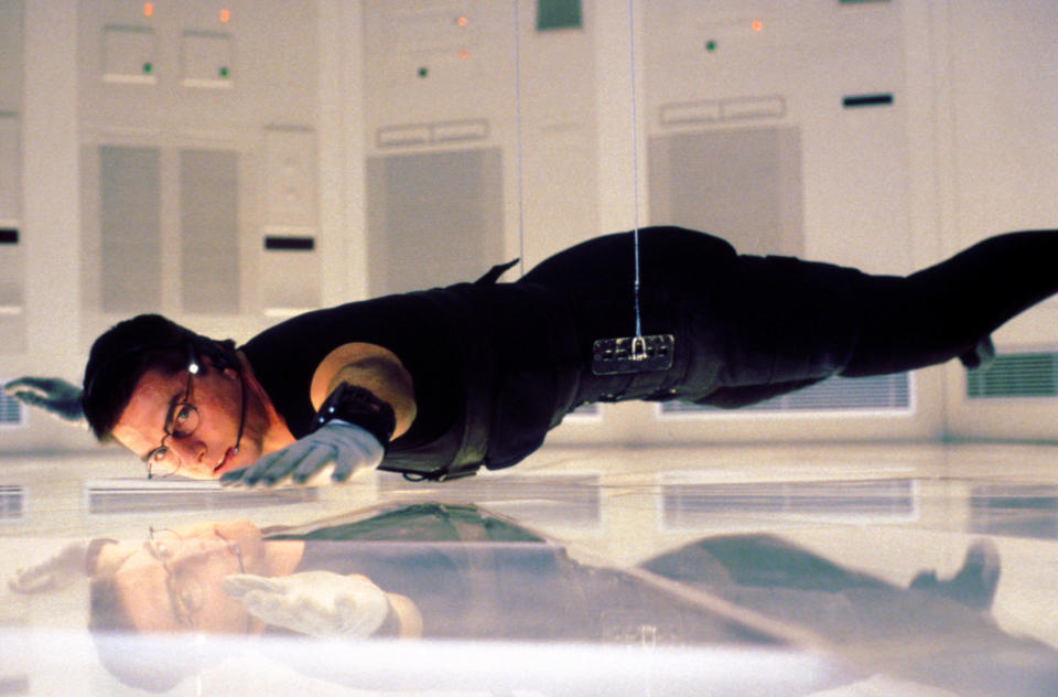 This mage released by CBS Entertainment, Tom Cruise appears in a scene from the first installment of the popular "Mission: Impossible" franchise. Throughout May, CBS is bringing back its Sunday movie showcase, a longtime network fixture that ended nearly 14 years ago. The film airs on Sunday, May 17. (CBS Entertainment via AP)