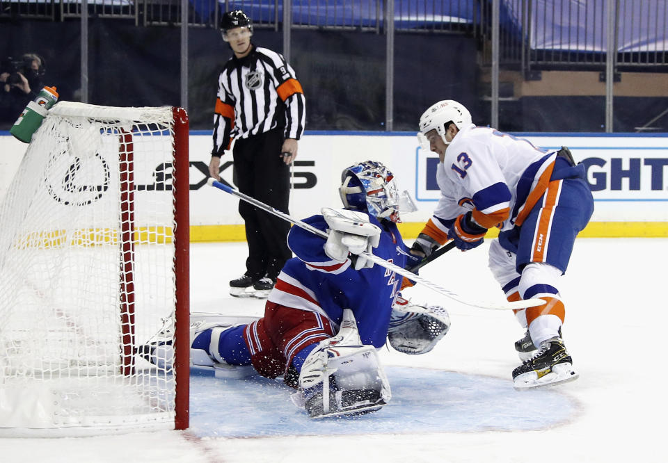 New York Rangers goalie Igor Shesterkin makes a save against New York Islanders' Mathew Barzal during the third period of an NHL hockey game Thursday, Jan. 14, 2021, in New York. (Bruce Bennett/Pool Photo via AP)