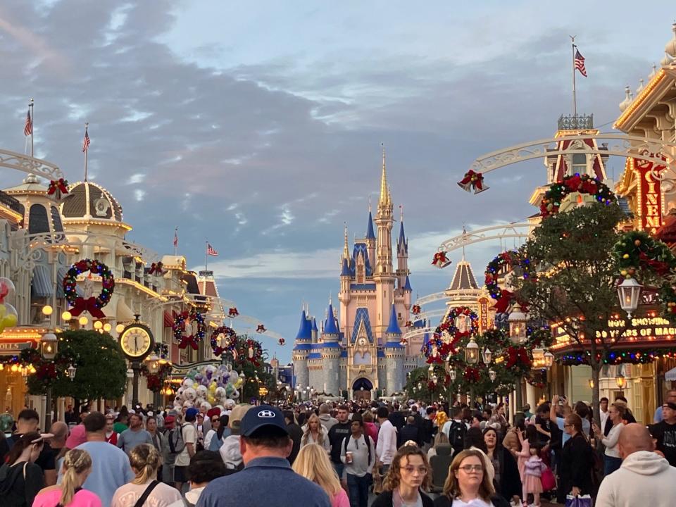 Decorations and people abound at Walt Disney World's Magic Kingdom over the holidays. Pictured: Thanksgiving Day, 2023.