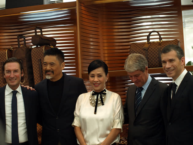 From left: Executive vice president of LV Pietro Beccari, HK star Chow Yun Fat and his wife Jasmine Tan, chairman and CEO of LV Yves Carcelle, general manager of SEA for LV Jean-Christophe Tevenin. (Yahoo! photo)