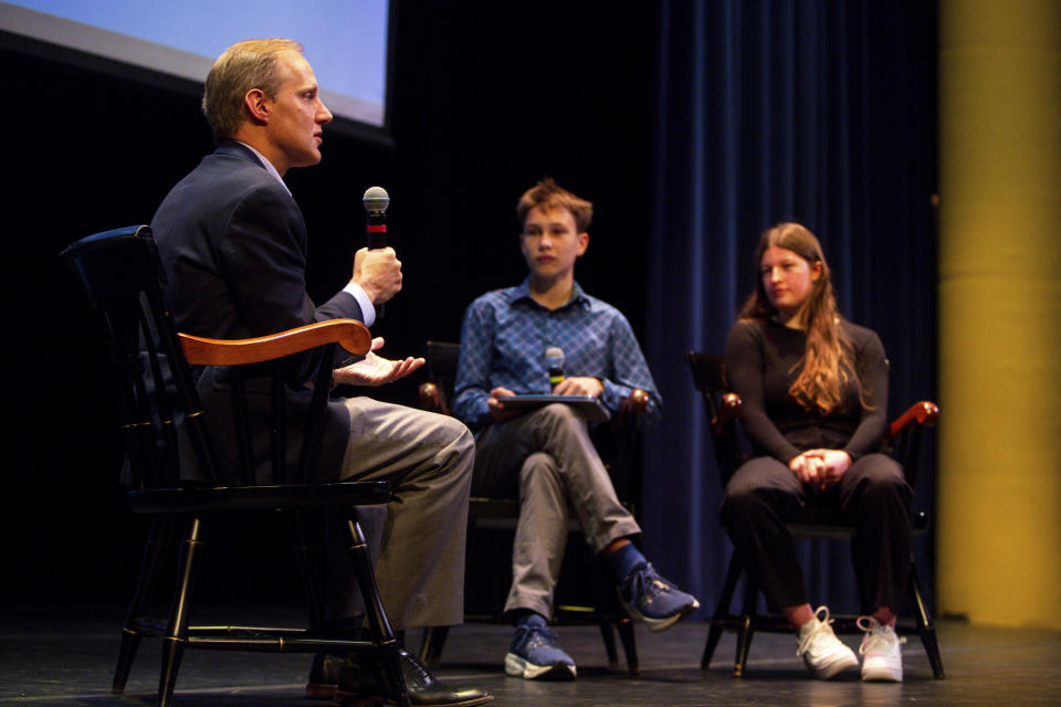 Breck School juniors Ainsley Kaufman and Graham Bailey interview Minnesota Secretary of State Steve Simon during a Q&A with members of Voterama, a student group focused on voter advocacy and awareness at Breck School in Golden Valley, Minn., Friday, Dec. 1, 2023. (AP Photo/Nicole Neri)