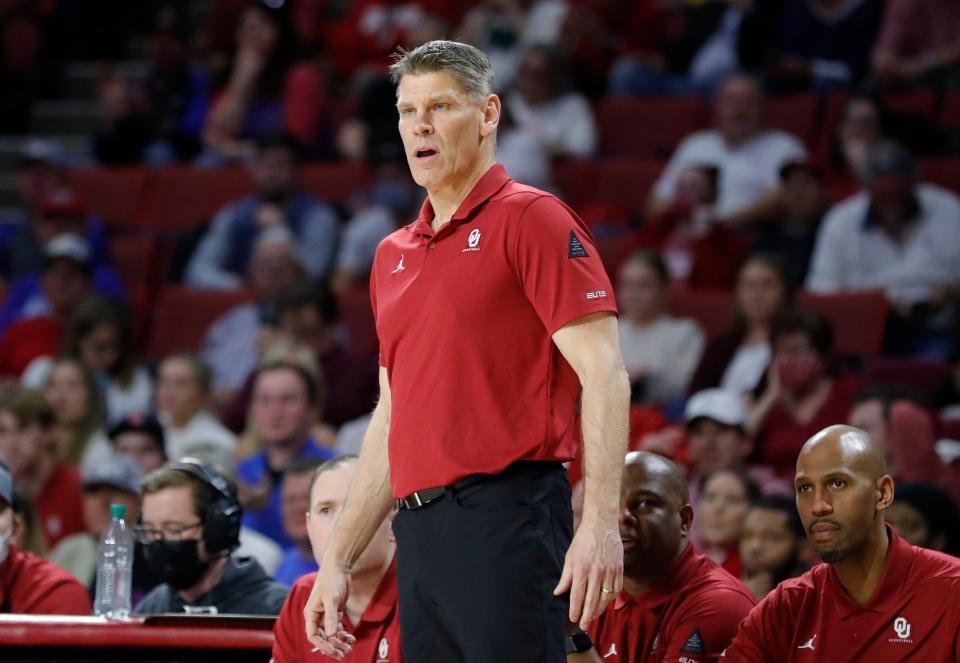 Oklahoma coach Porter Moser watches his team play against Kansas on Tuesday in Norman, Okla.