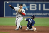 Miami Marlins' Williams Astudillo forces Tampa Bay Rays' Taylor Walls (6) at second base and relays the throw to first in time to turn a double play during the eighth inning of a baseball game Wednesday, May 25, 2022, in St. Petersburg, Fla. (AP Photo/Chris O'Meara)