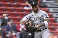 Chicago White Sox's Yoan Moncada throws to first in the third inning of a baseball game, Sunday, April 18, 2021, in Boston. (AP Photo/Steven Senne)