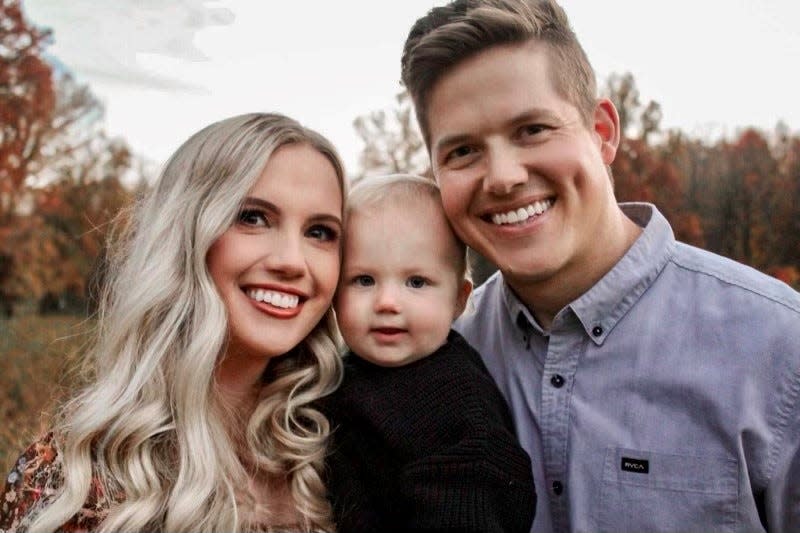 Alex, Tommy and Landon Ball look forward to opening a new Crumbl Cookies store in late October at 2152 Walker Lake Road. Franchise owner Landon said the family photo will change in a couple weeks as the couple are expecting a second son.