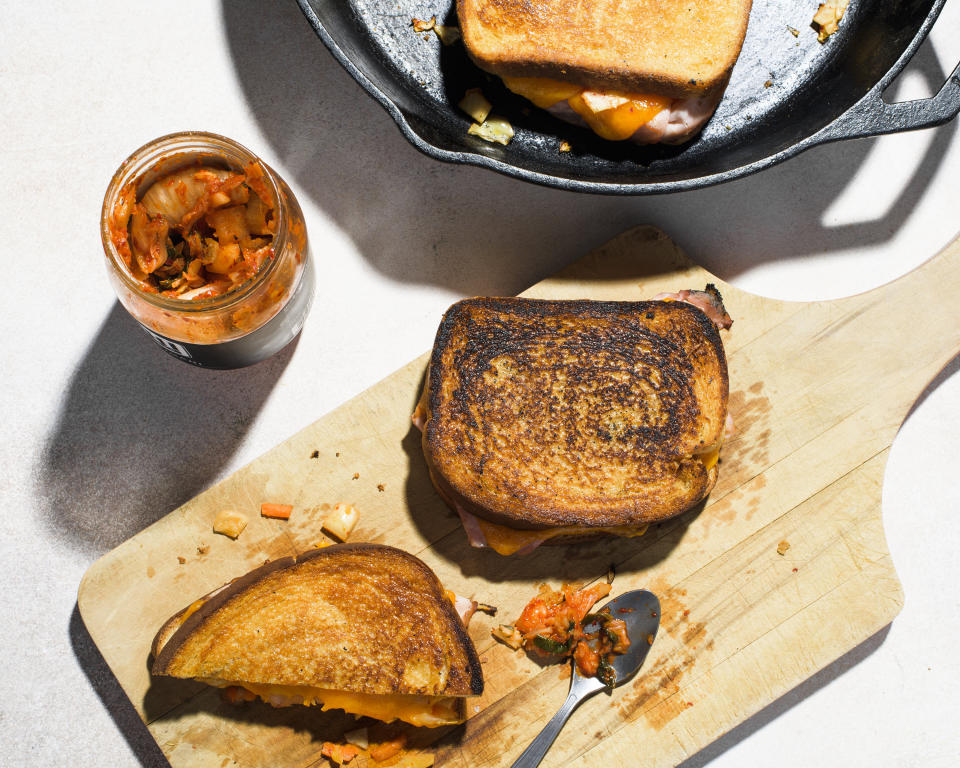 This image released by Milk Street shows a recipe for Kimchi Grilled Cheese with Ham. (Milk Street via AP)