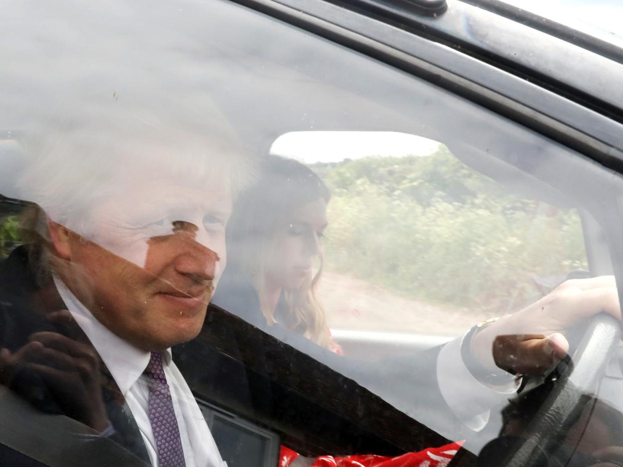 Boris Johnson and Carrie Symonds leave his home, following the results of the European Parliament elections, in Thame, Britain May 27, 2019.