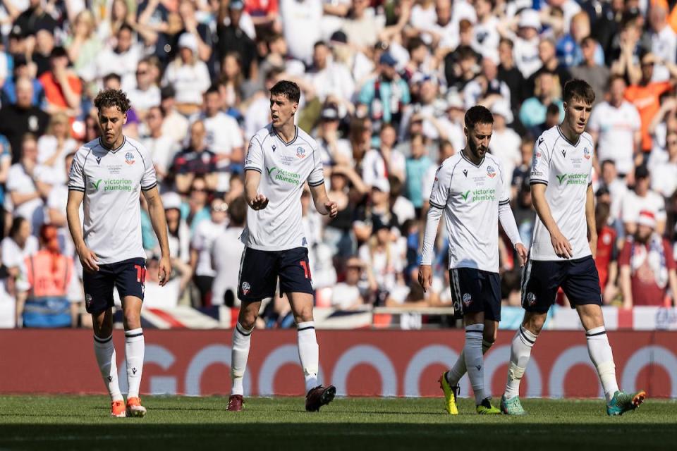 Wanderers players react after conceding the second goal to Oxford at Wembley <i>(Image: Camerasport)</i>