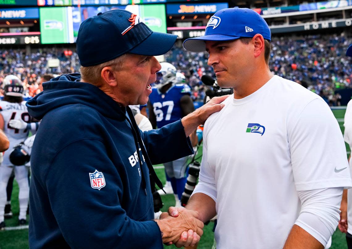 Denver Broncos head coach Sean Payton and Seattle Seahawks head coach Mike Macdonald shake hands after the Seattle Seahawks 26-20 victory against the Denver Broncos at Lumen Field, on Sunday, Sept. 8, 2024, in Seattle, Wash.