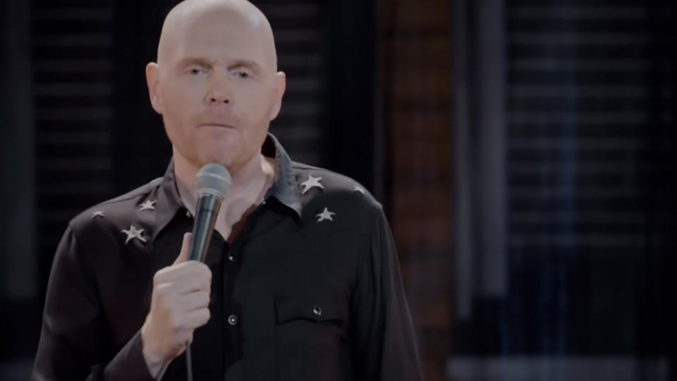 Bill Burr looking frustrated during his stand up act.