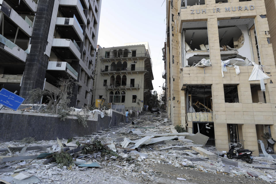 Destruction is seen after a massive explosion in Beirut, Lebanon, Wednesday, Aug. 5, 2020. The explosion flattened much of a port and damaged buildings across Beirut, sending a giant mushroom cloud into the sky. In addition to those who died, more than 3,000 other people were injured, with bodies buried in the rubble, officials said.(AP Photo/Hassan Ammar)