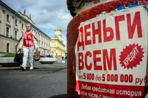 A notice advertises loans in downtown Moscow -- 51 percent of Russians have an outstanding debt, up from 26 percent a decade ago, according to a study by state pollster VTsIOM