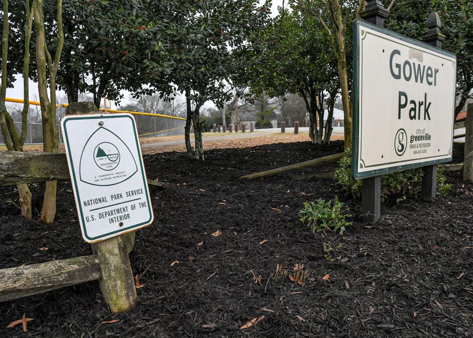 A sign marking Land & Water Conservation Fund outdoor recreation from the National Park Service, next to one for Gower Park in Greenville, S.C. Tuesday, January 31, 2023.  Thirteen recreation projects in South Carolina were the recipients of federal Land and Water Conservation Fund (LWCF) grants, including $500,000 of the $1,400,000 project at Gower Park to renovate tennis and basketball courts, parking, and add new basketball, pickleball, and tennis courts. 