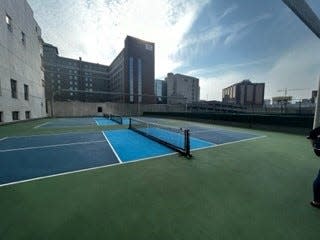 The Amway Grand Plaza in Grand Rapids converted two rooftop tennis courts into pickleball courts.