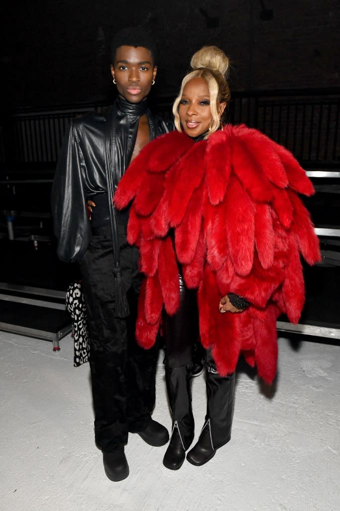 Mary J. Blige posing with model Alton Mason in the front row. - Credit: Courtesy