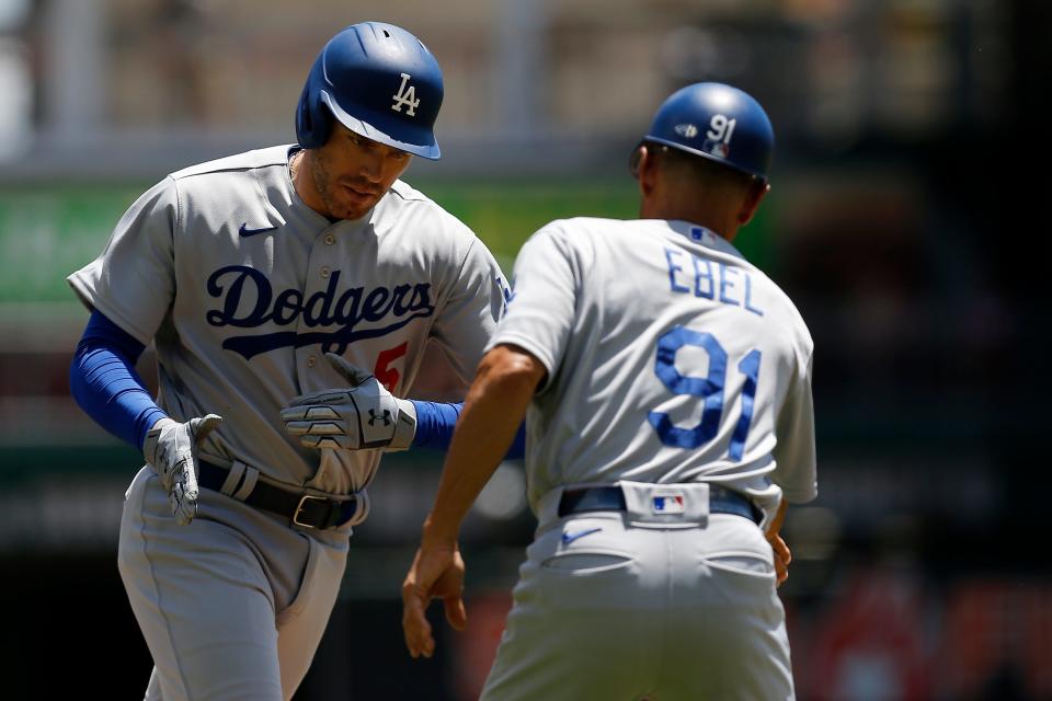 Los Angeles Dodgers first baseman Freddie Freeman (5) rounds third on a two-run home run in the third inning of the MLB National League game between the Cincinnati Reds and the Los Angeles Dodgers at Great American Ball Park in downtown Cincinnati on Thursday, June 23, 2022.