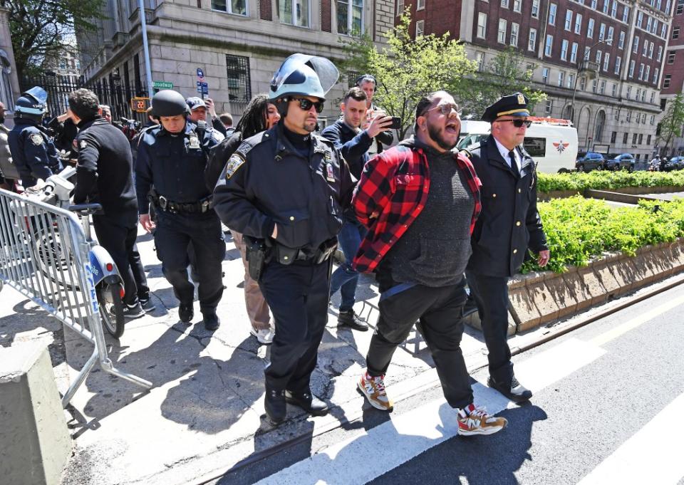 As he was led away in handcuffs by officers, Parra chanted, “Resistance is justified when people face genocide.” Matthew McDermott