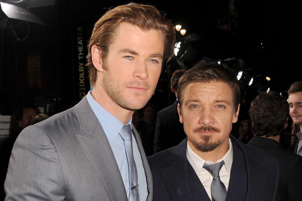 <p>Kevin Winter/Getty Images</p> Chris Hemsworth and Jeremy Renner