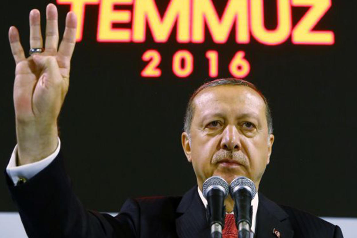 The Turkish President addressing his supporters in Istanbul: Reuters