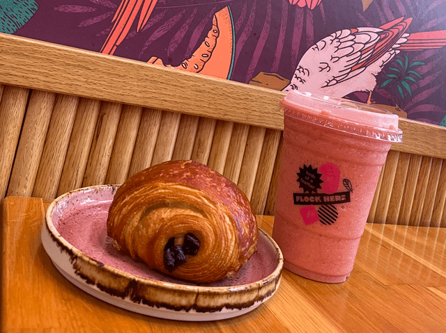 <p>Sari Hitchins</p> Pastry and a smoothie at Parakeet Cafe