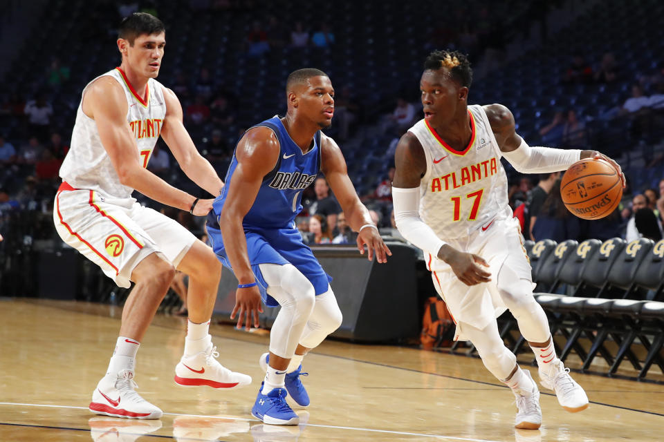 Dennis Schröder (right) will get his chance to prove that he’s a foundational piece for a Hawks team in transition. (AP)