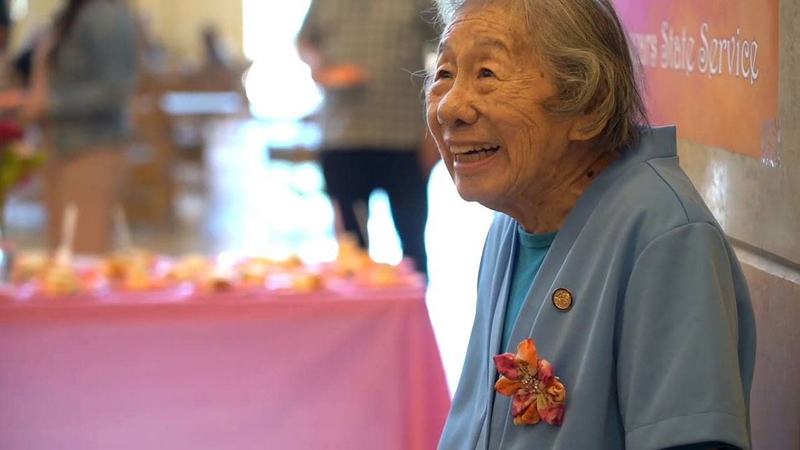Department of General Services analyst May Lee celebrates her 99th birthday at the ziggurat office building in West Sacramento in 2019, as she is honored he 76th year of working for the state of California. She died on May 26, 2023, after serving 80 years as state worker.