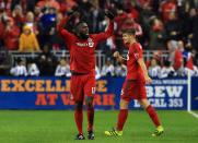 <p>Jozy Altidore #17 of Toronto FC celebrates a goal during the first half of the MLS Eastern Conference Final, Leg 2 game against Montreal Impact at BMO Field on November 30, 2016 in Toronto, Ontario, Canada. (Photo by Vaughn Ridley/Getty Images) </p>