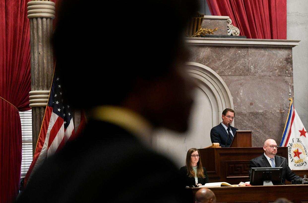 Speaker Cameron Sexton, R-Crossville, stands at the front of General Assembly as Rep. Justin Pearson, D-Memphis, stands near his desk on the first day of Tennessee's special legislative session on public safety in Nashville, Tenn., Monday, Aug. 21, 2023.