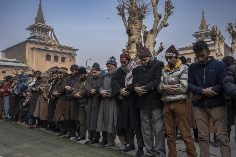 Kashmiris offer special prayers in the compound of Jamia Masjid or Grand Mosque in Srinagar, Indian controlled Kashmir, Friday, Jan. 12, 2024. Special congregational prayers known as "Salatul Istisqa" were organized by Anjuman Aquaf Jamia Masjid for respite from the prevailing dry weather conditions in Kashmir valley. (AP Photo/Dar Yasin)