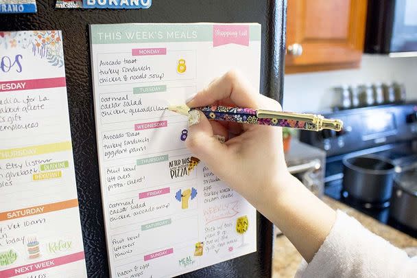 A magnetic meal planning pad with a detachable shopping list
