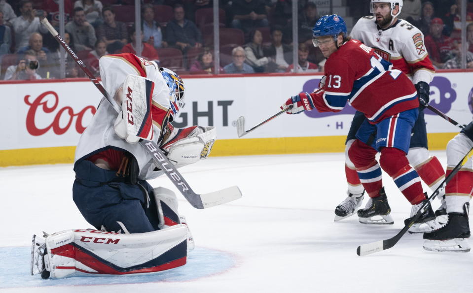 Florida Panthers goaltender Sam Montembeault makes a save on Montreal Canadiens' Max Domi during the first period of an NHL hockey preseason game Thursday, Sept. 19, 2019, in Montreal. (Paul Chiasson/The Canadian Press via AP)