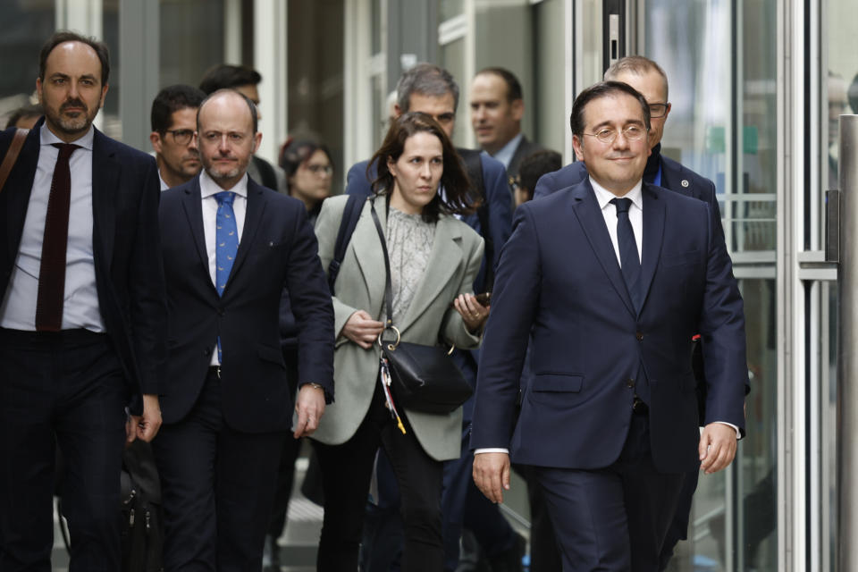 Spain's Foreign Minister Jose Manuel Albares Bueno, right, walks outside EU headquarters in Brussels, Friday, April 12, 2024. British and Spanish foreign ministers are scheduled to meet Friday with a top European Commission official for another round of negotiations over the status of the disputed territory of Gibraltar following Britain's exit from the European Union. (AP Photo/Omar Havana)