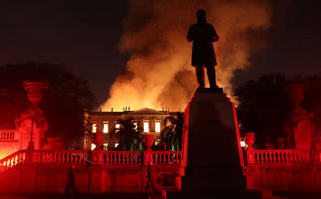 Firefighters try to extinguish a fire at the National Museum of Brazil in Rio de Janeiro, Brazil September 2, 2018. REUTERS/Ricardo Moraes