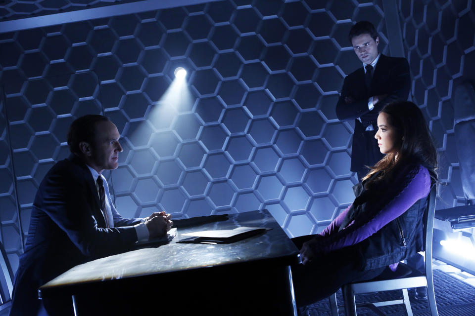 This publicity photo released by ABC shows from left, Clark Gregg, Brett Dalton, and Chloe Bennet in a scene from "Marvel's Agents of S.H.I.E.L.D.," produced by ABC Studios and Marvel Television. (AP Photo/ABC, Justin Lubin)