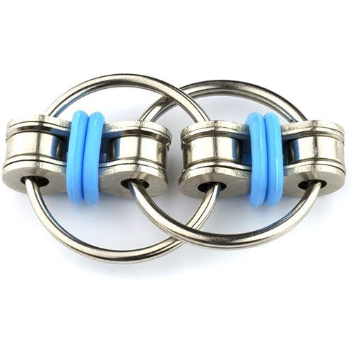 <p><strong>Tom's Fidgets</strong></p><p>amazon.com</p><p><strong>$7.99</strong></p><p><a href="https://www.amazon.com/dp/B01MAYBTA0?tag=syn-yahoo-20&ascsubtag=%5Bartid%7C10055.g.34935171%5Bsrc%7Cyahoo-us" rel="nofollow noopener" target="_blank" data-ylk="slk:Shop Now;elm:context_link;itc:0;sec:content-canvas" class="link ">Shop Now</a></p><p>This tiny toy is nothing more than a few bolts and rings attached for flipping and spinning, but fans say it keeps their hands busy and has <strong>even helped them kick smoking or biting their nails</strong>. Note: The small size means it's not recommended for younger kids.</p>