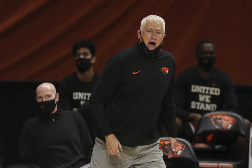 Oregon State head coach Wayne Tinkle calls instructions to players during the second half of an NCAA college basketball game against Oregon in Corvallis, Ore., Sunday, March 7, 2021. (AP Photo/Amanda Loman)