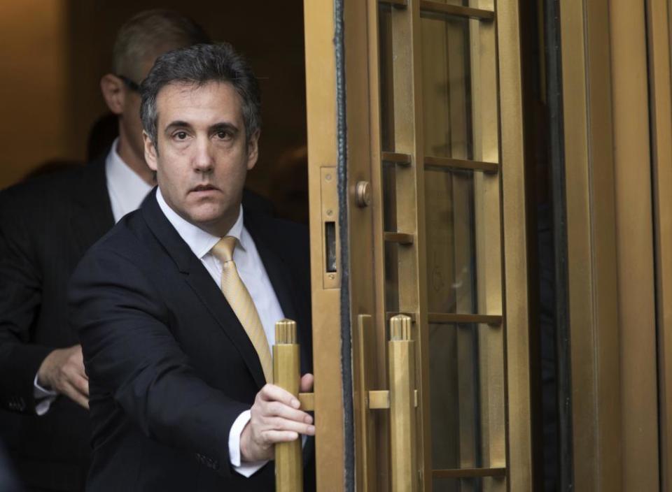 Michael Cohen leaves federal court in New York.